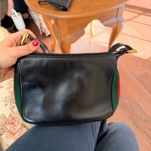 vintage Gucci shoulder bag (black leather with classic green/red web stripe).